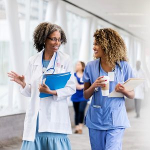 two nurses talking